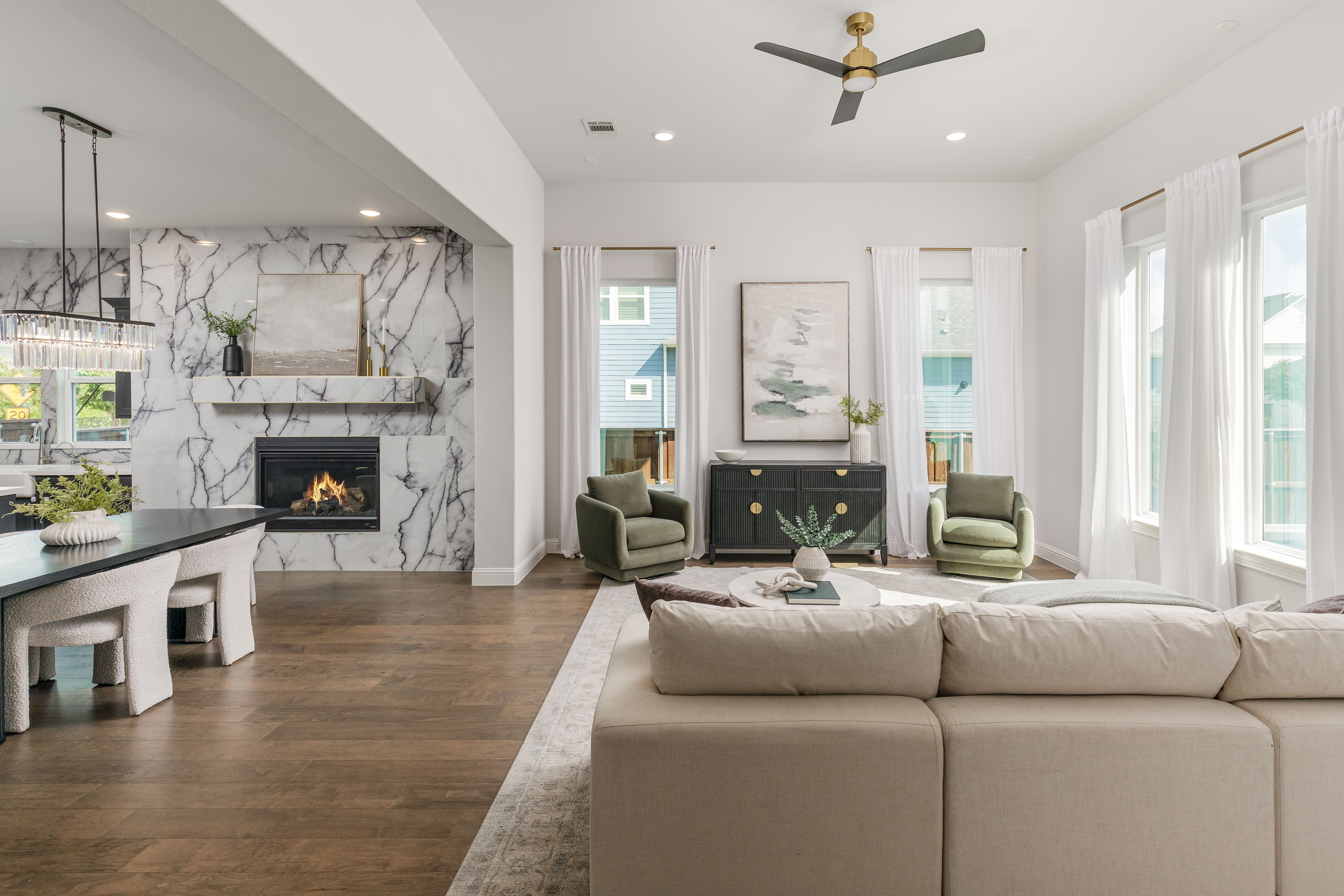 Open Living Room with Marble Fireplace